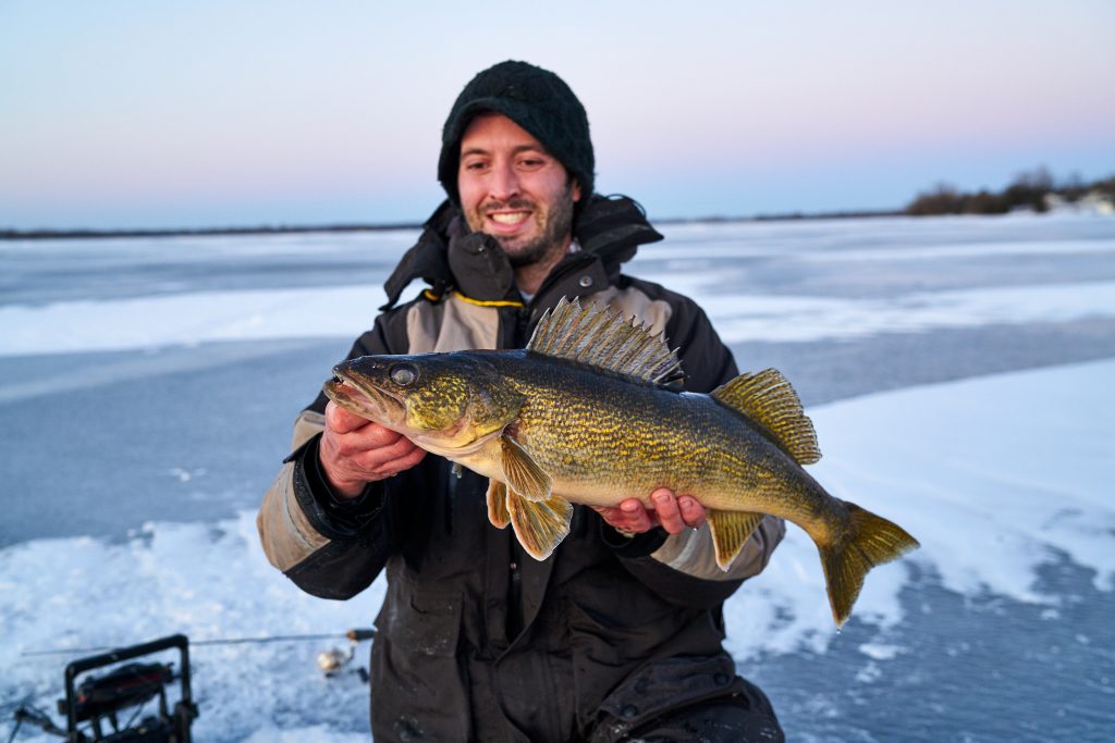 ice hut fishing bay of quinte rods walleye