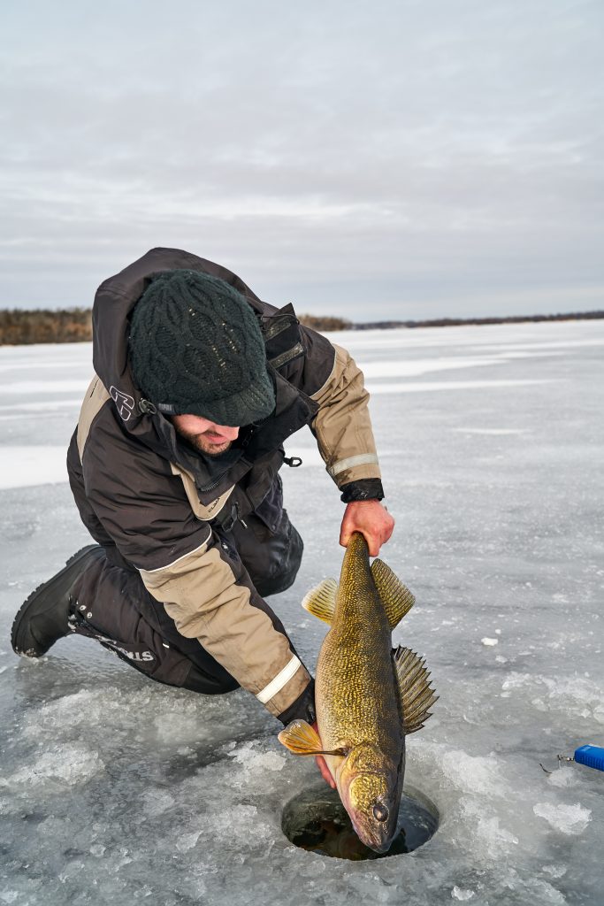 bay of quinte ice fishing hut auger walleye winter